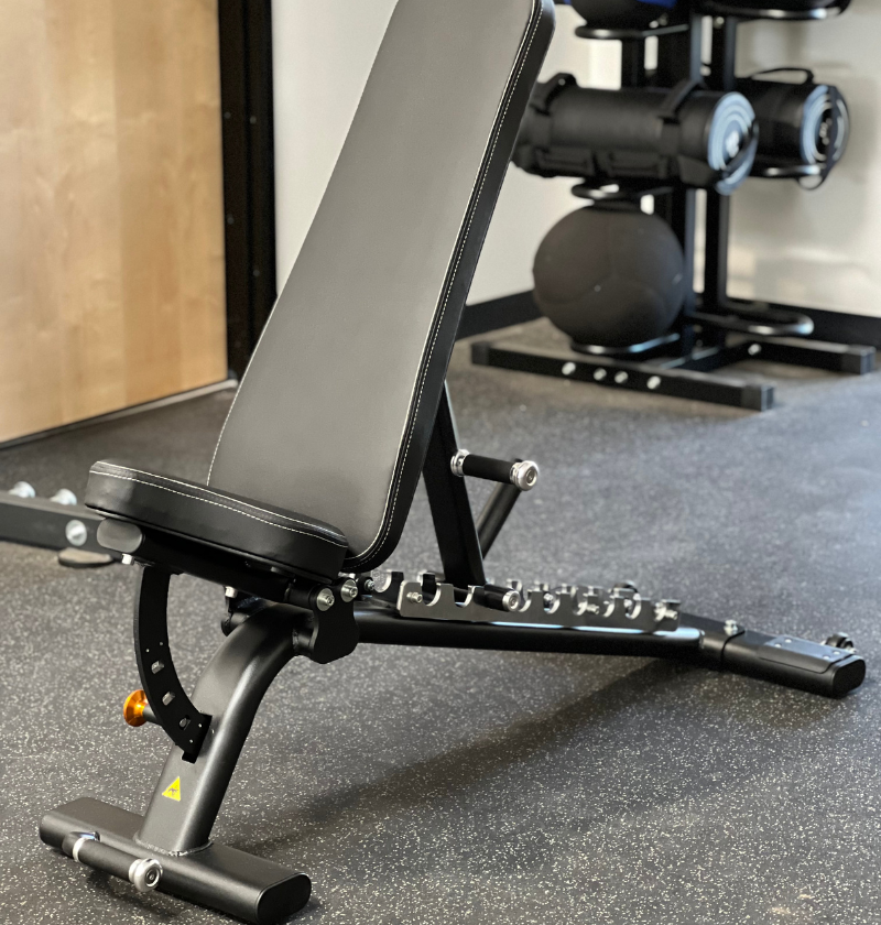 Adjustable Flat Incline Bench PL7328 displayed on a white background, showcasing its versatile design for workouts.