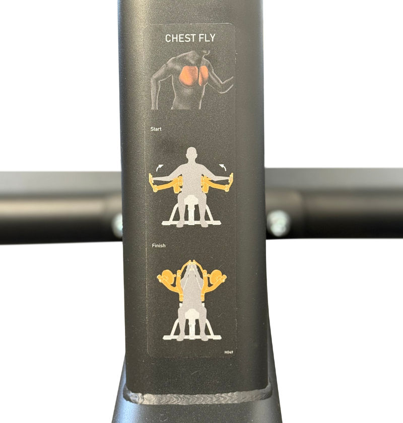 Black chest fly machine with chest fly exercise illustration on a white background