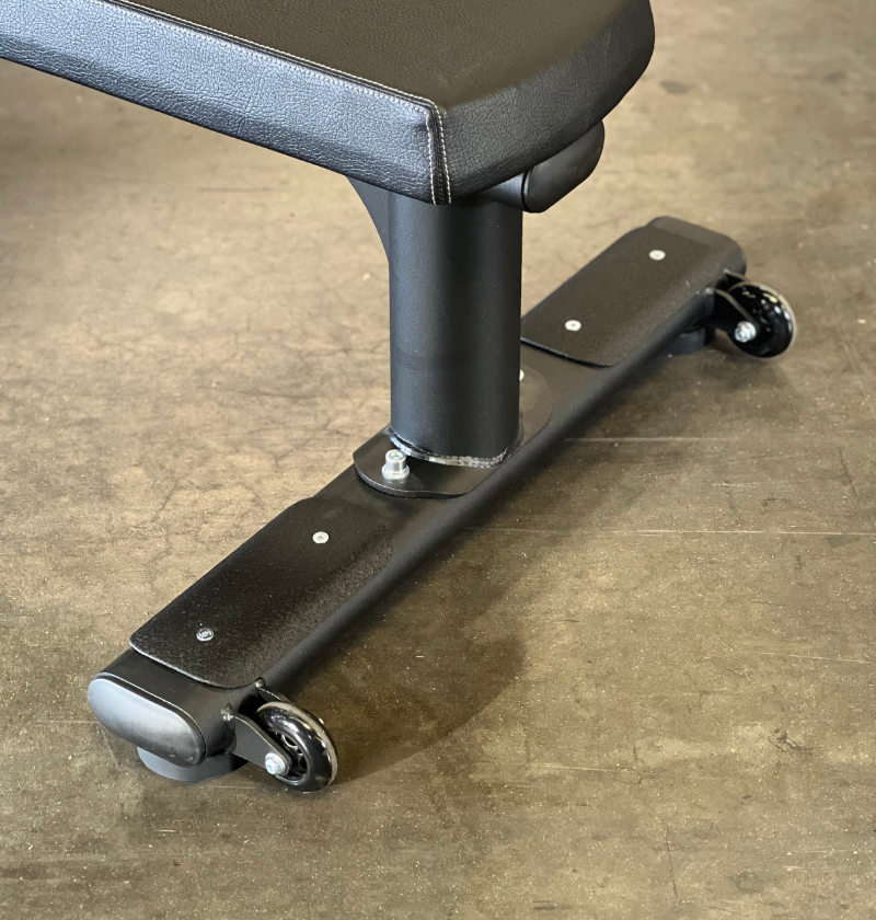 close-up of black flat bench rear leg with wheels