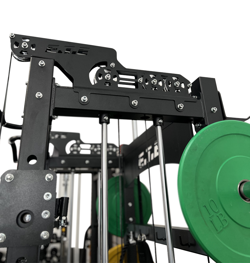 All-in-1 half rack with functional trainer, featuring a power rack and green weight plates displayed prominently.