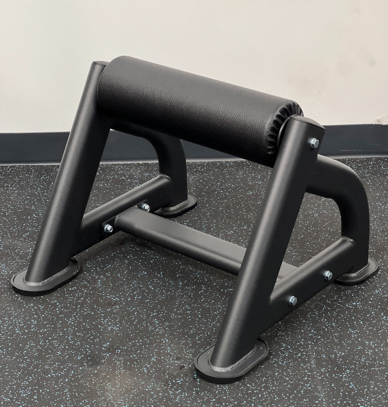 A black Bulgarian Split Squat Stand on the floor, intended for strength training exercises.