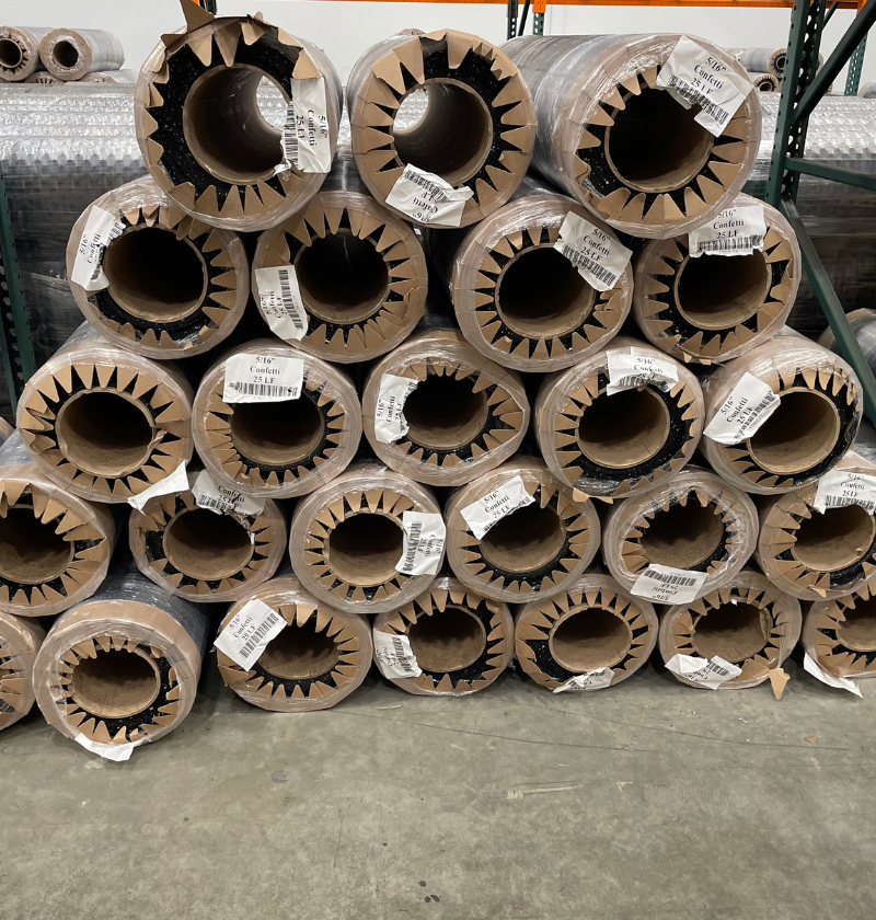 Rolls of confetti rubber gym flooring