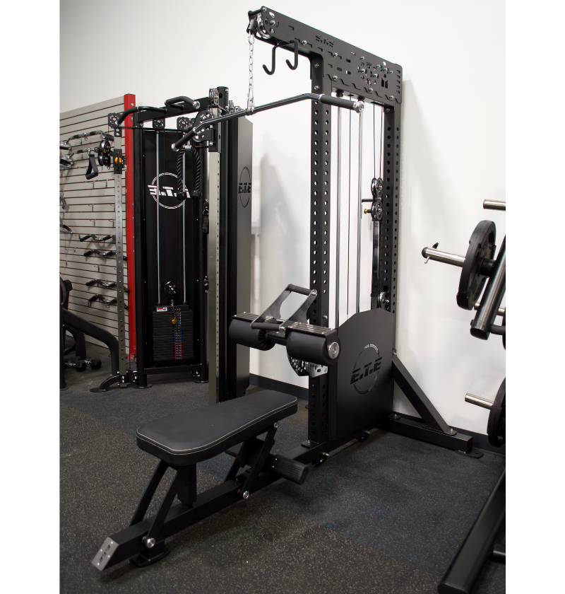 A gym layout showcasing a squat rack, bench press, and pull-up bar, featuring a pre-order sign for Lat Pulldown Low Row.