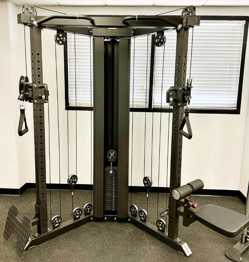 Cable machine with a single 200lbs weight stack in a gym showroom.