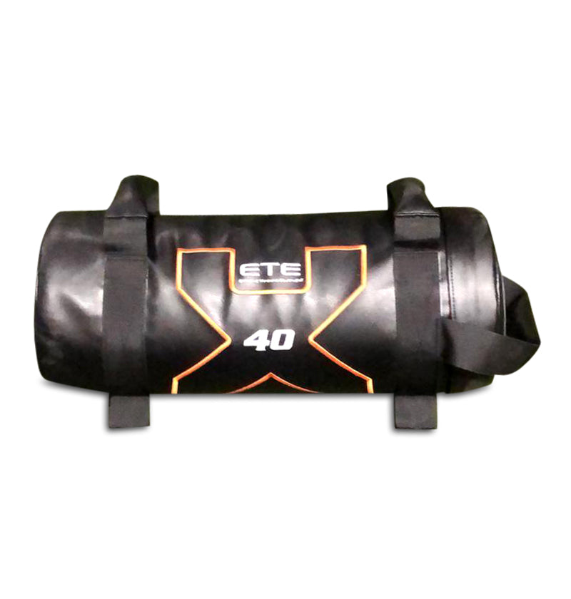 A stylish black and orange gym bag with the word "ETE" printed on it, ideal for workouts or sports activities.