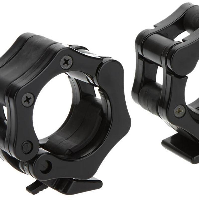 A pair of black standard locking collars for weights.