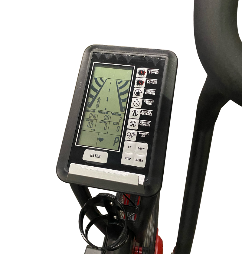 Close-up image of a fitness machine's digital display, indicating various workout parameters and options.
