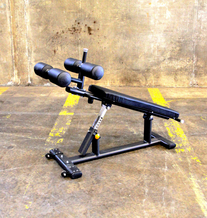 A black gym bench set up for fitness activities.