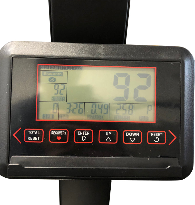 A digital display on a sleek black machine, showcasing various data and settings in bright, clear text.