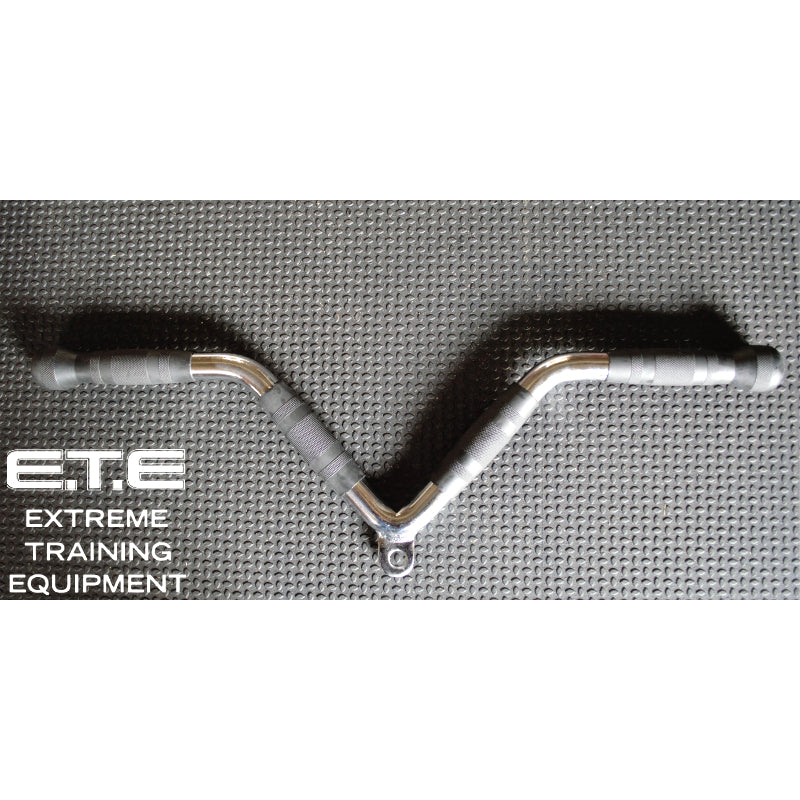 Black handlebar with a silver grip, designed with a solid V shape attachment for gym workouts and improved handling.