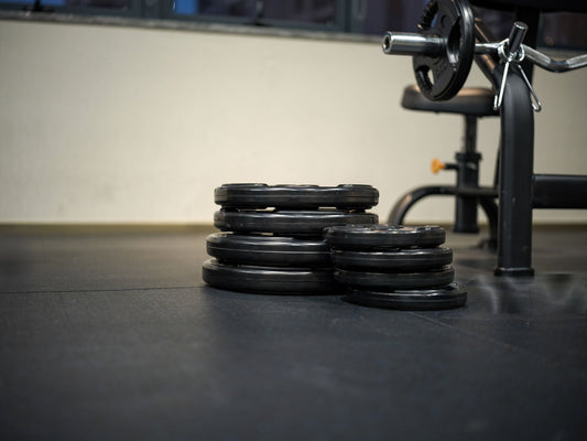Olympic Plate Sets vs Standard Plates: Which One Is Right for Your Gym?