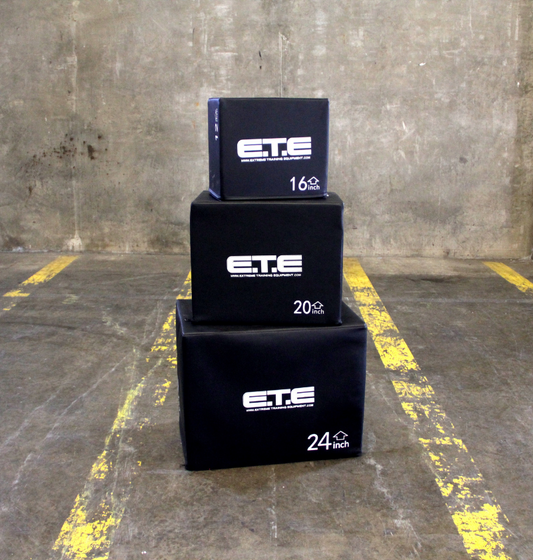 Three stacked plyo boxes labeled ETE on each box, showcasing a fitness training setup.