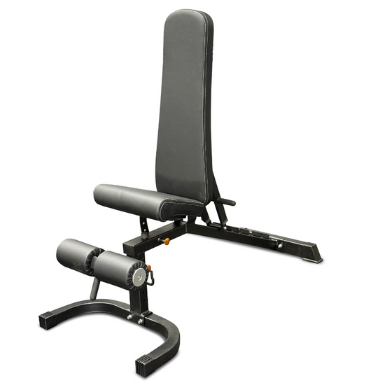 A grey gym bench featuring a padded seat and a footrest for added support during workouts.