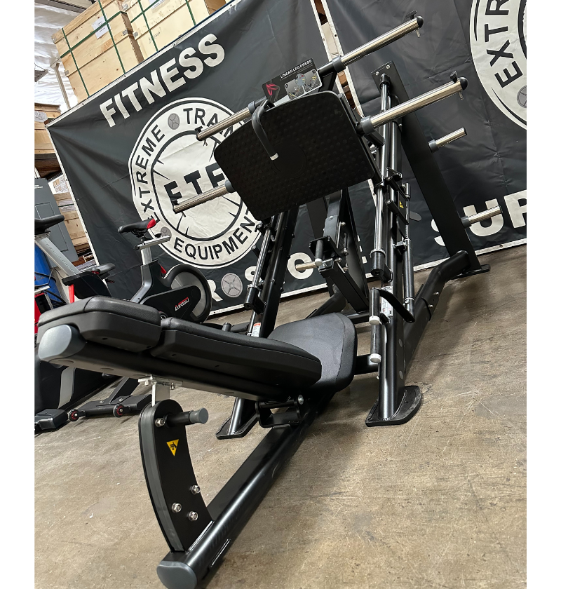 45 degree linear leg press in a warehouse setting.