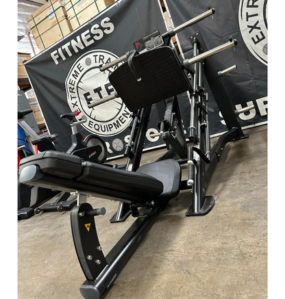 45 degree linear leg press in a warehouse setting.