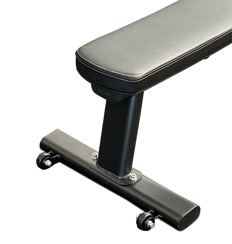 A black bench featuring a sleek black seat and a matching footrest.