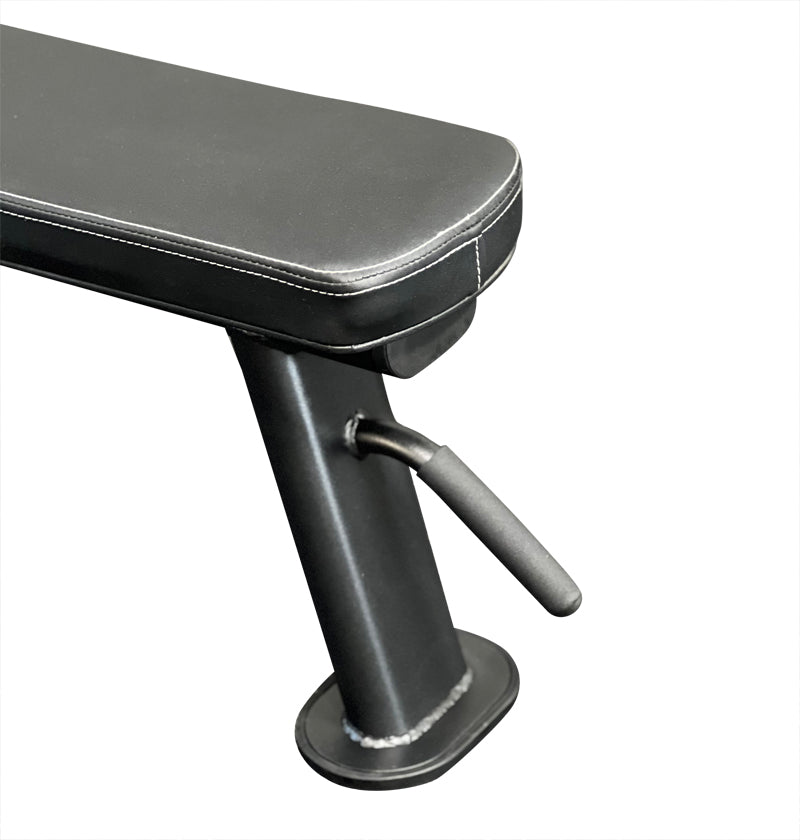 A black bench featuring a sturdy metal footrest for added comfort and support.