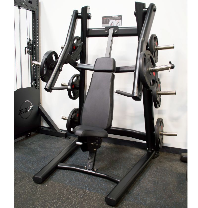 plate loaded chest press in a gym setting 