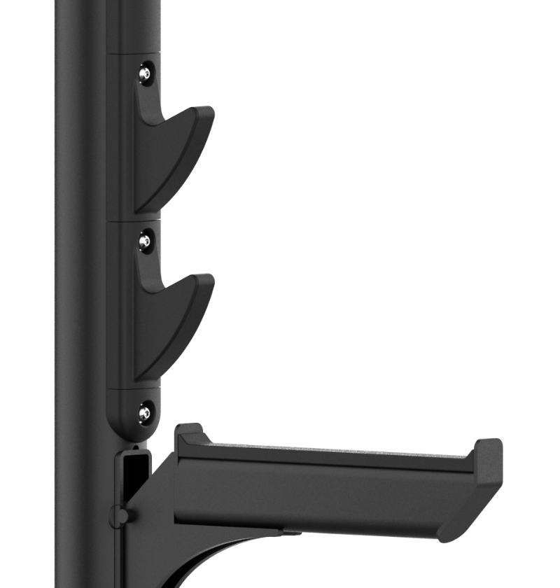 Up-close of the black safety arm and bar rests on the incline olympic bench press