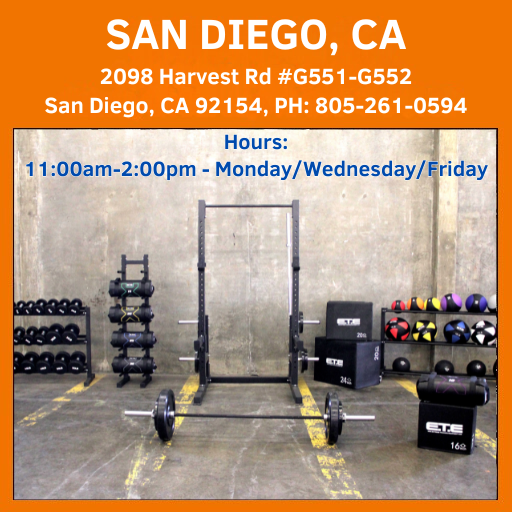 A variety of gym equipment in a San Diego, CA gym, including weights and exercise machines for fitness enthusiasts.