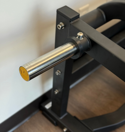 Close-up of a weight storage peg on the front squat in the showroom.