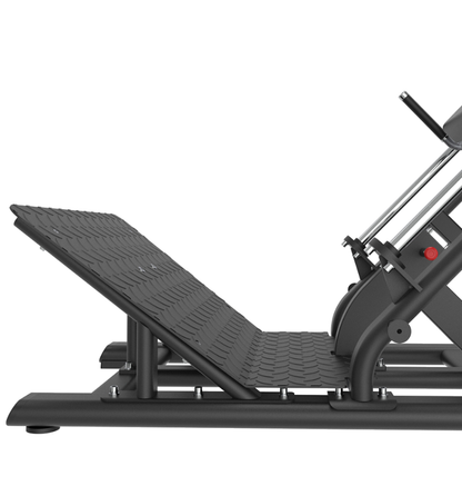 Black on-slip foot plate on a hack squat machine on a white background