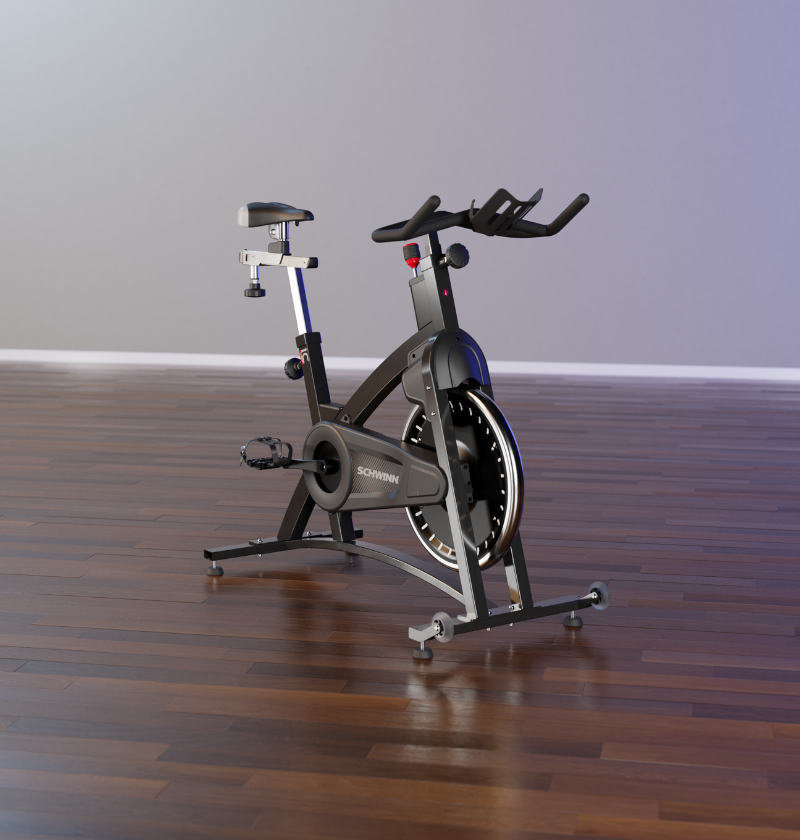Schwinn spin bike on a wooden floor with a plain wall background