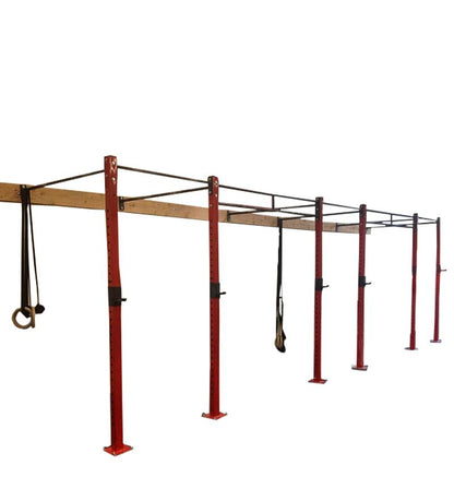 Wall-mounted pull-up rig featuring a red and black crossbar with two attached ropes for strength training exercises.