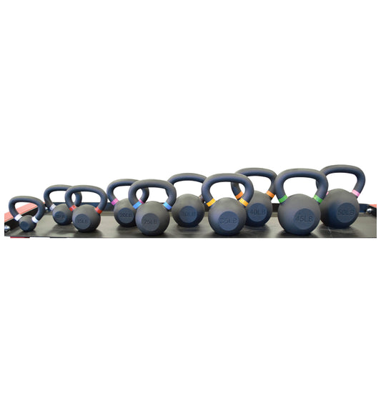 A set of kettlebells, weights from 5 to 50 lbs, arranged neatly against a white backdrop.